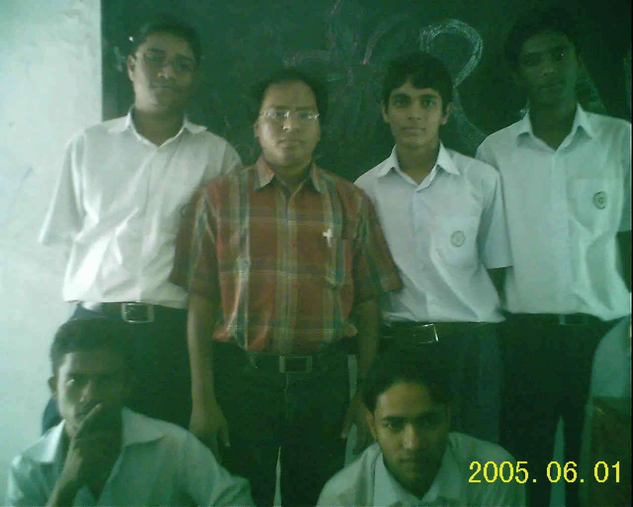 BCIC classroom teacher and students group photo